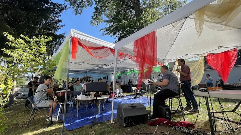 White event tent on the church grounds
